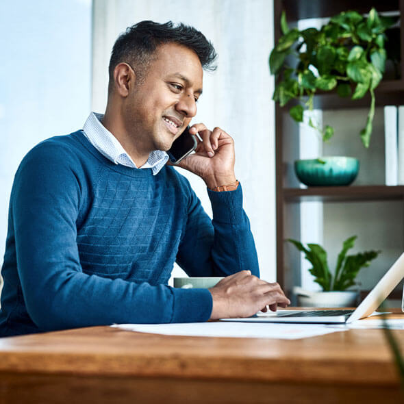 male broker on the phone