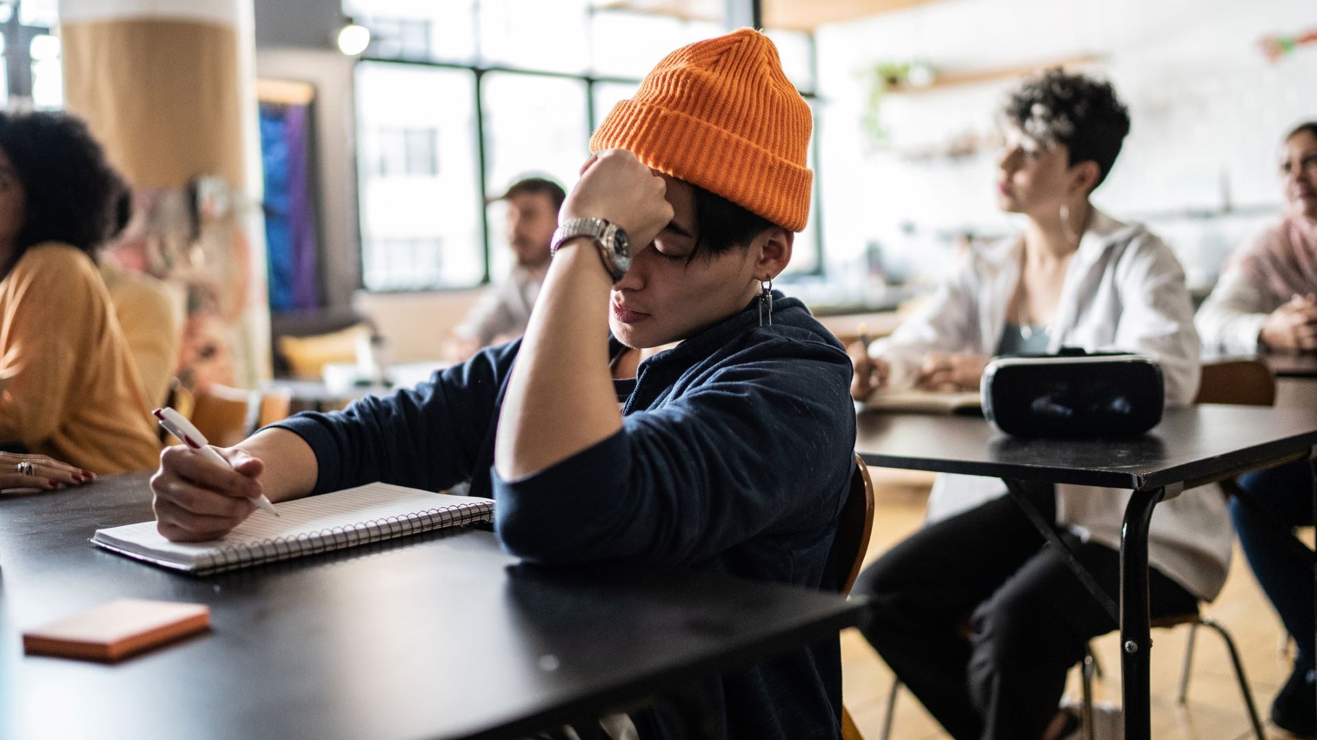 student with headache