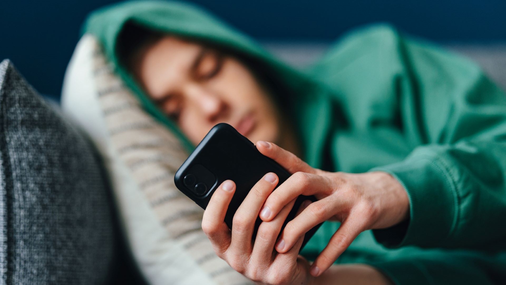 teenager on cell phone